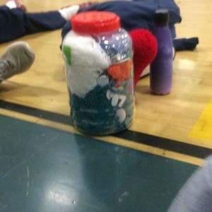 Big bucket of yarn and Lily’s foot